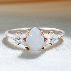 Pear Cut Opal Engagement Ring with Moissanite Blossom
