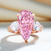 Gorgeous Pear Cut Pink Sapphire Three Stone Engagement Ring