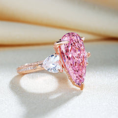 Gorgeous Pear Cut Pink Sapphire Three Stone Engagement Ring