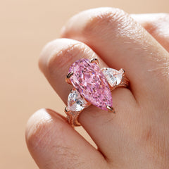 Gorgeous Pear Cut Pink Sapphire Three Stone Engagement Ring