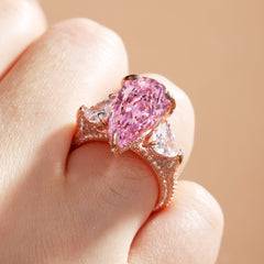 Gorgeous Pear Cut Pink Sapphire Three Stone Engagement Ring