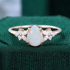 Pear Cut Opal Engagement Ring with Moissanite Blossom