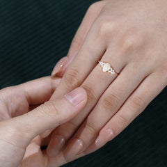 Pear Cut Opal Engagement Ring with Moissanite Blossom