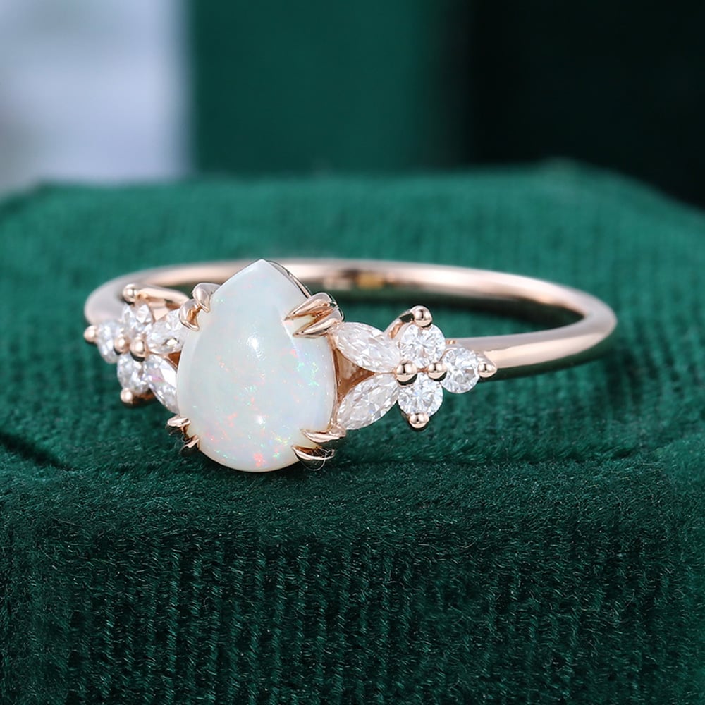 Pear Cut Opal Engagement Ring with Moissanite Blossom