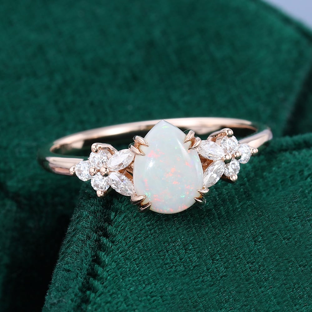 Pear Cut Opal Engagement Ring with Moissanite Blossom