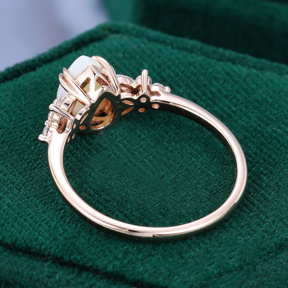 Pear Cut Opal Engagement Ring with Moissanite Blossom