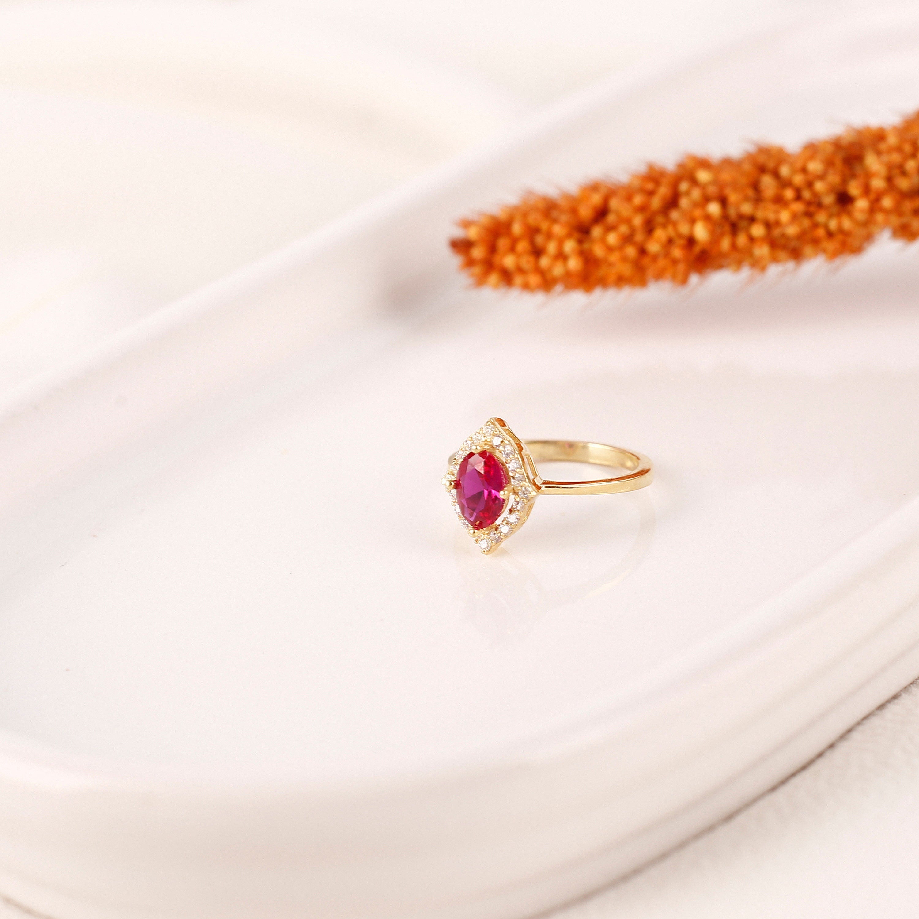 Oval Cut Ruby Wedding Ring